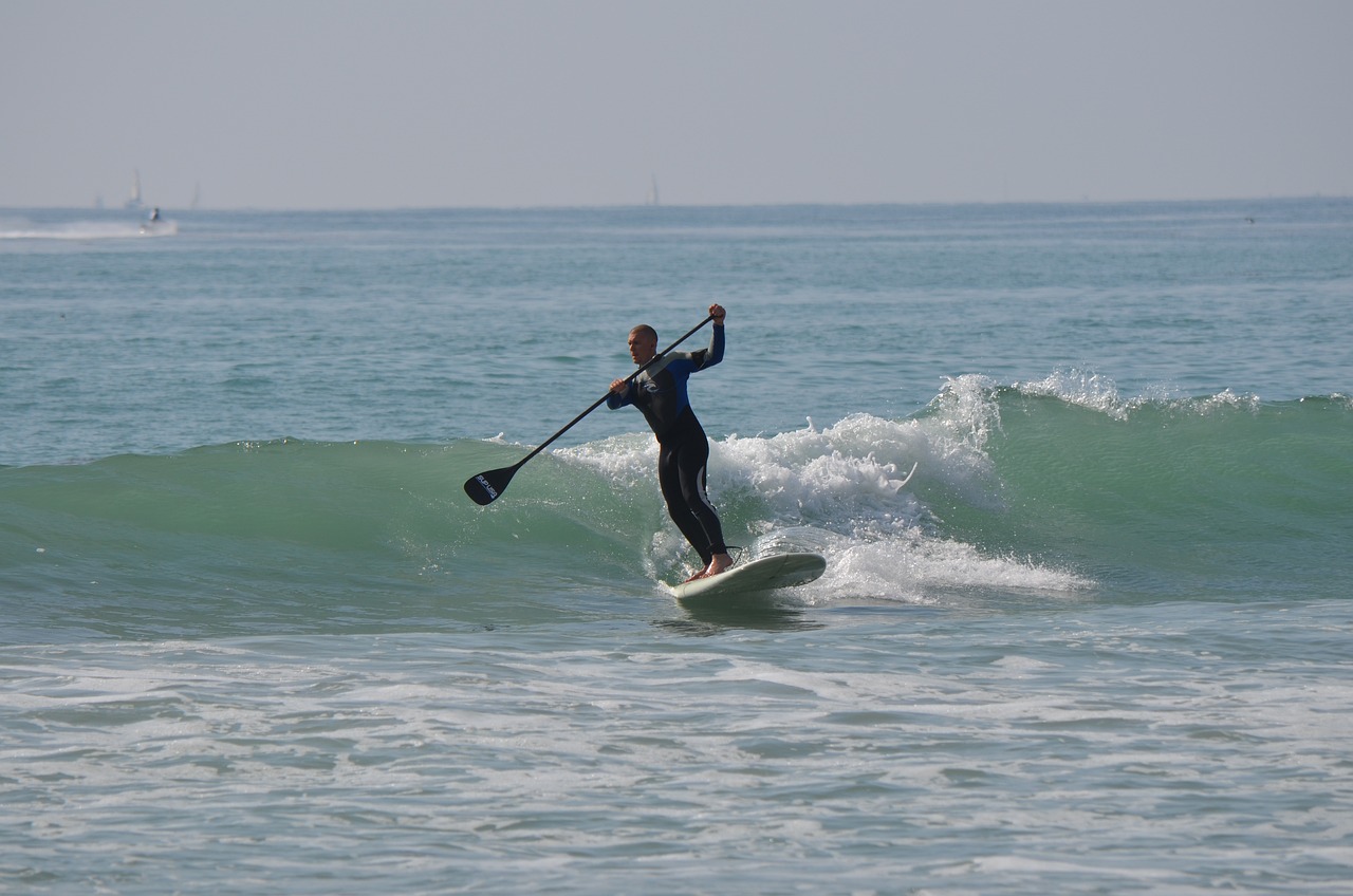 A man enjoying Oahu SUP